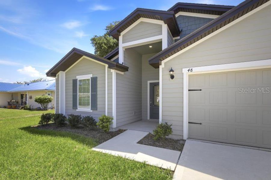 Exterior details and patio area of a home in Palm Coast, Palm Coast (Image 24).