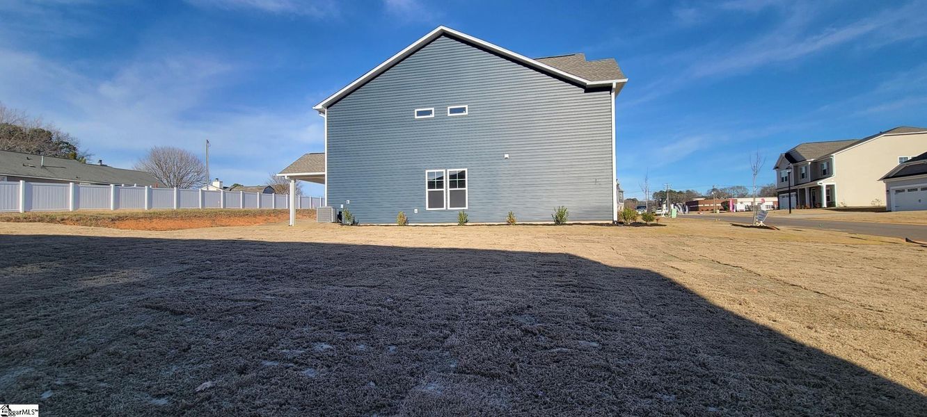 Exterior details and patio area of a home in Halton Oaks, Spartanburg (Image 19).