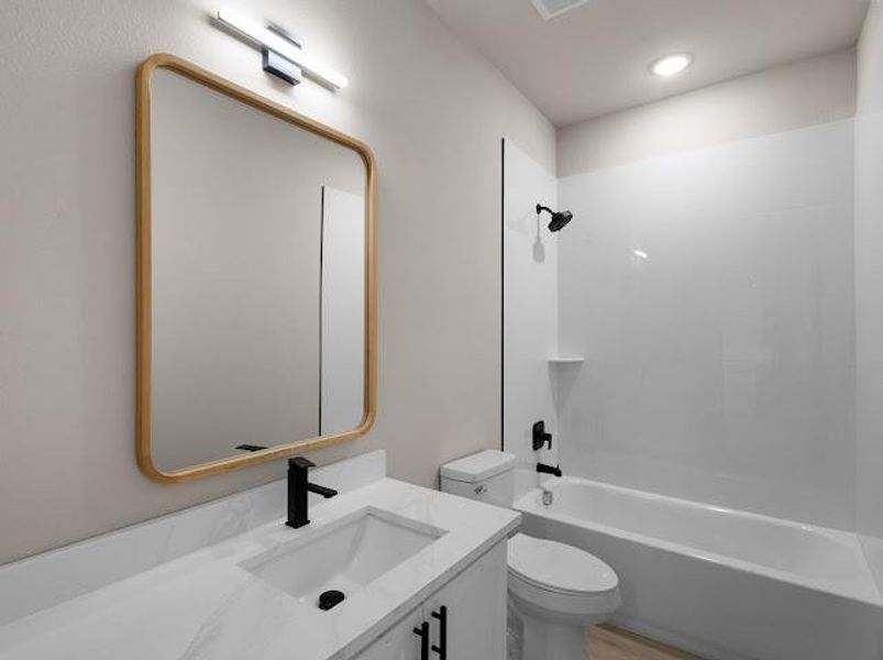 Full bath with tub / shower combination and vanity