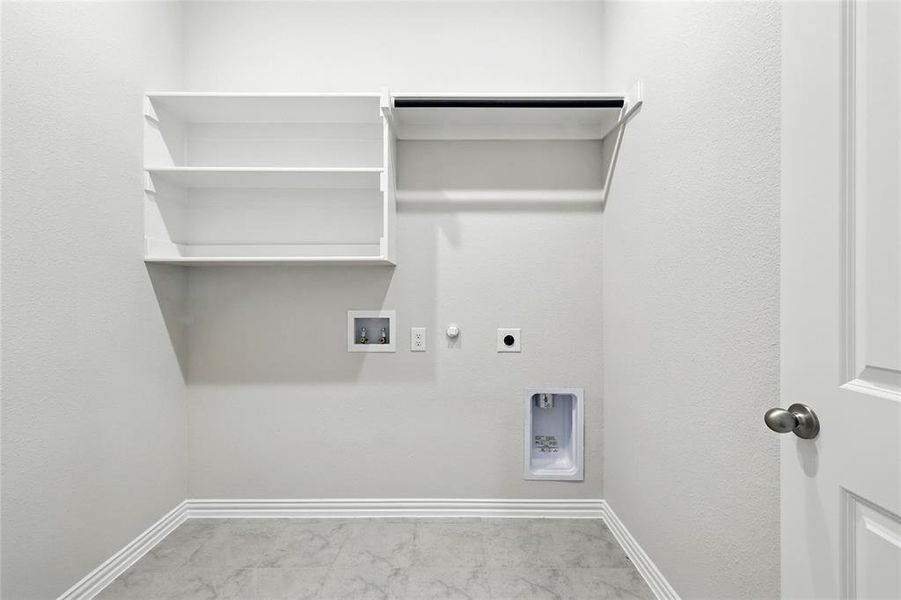 Laundry room with hookup for a gas dryer, electric dryer hookup, and washer hookup