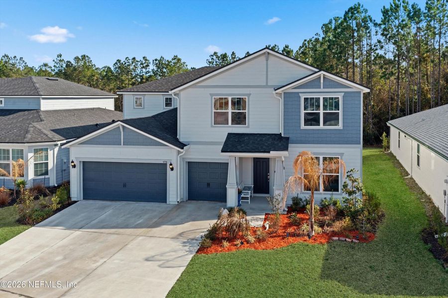 Front exterior of a new home in , Middleburg, FL, highlighting curb appeal (Image 29). Front exterior of a new home in , Middleburg, FL, highlighting curb appeal (Image 29).