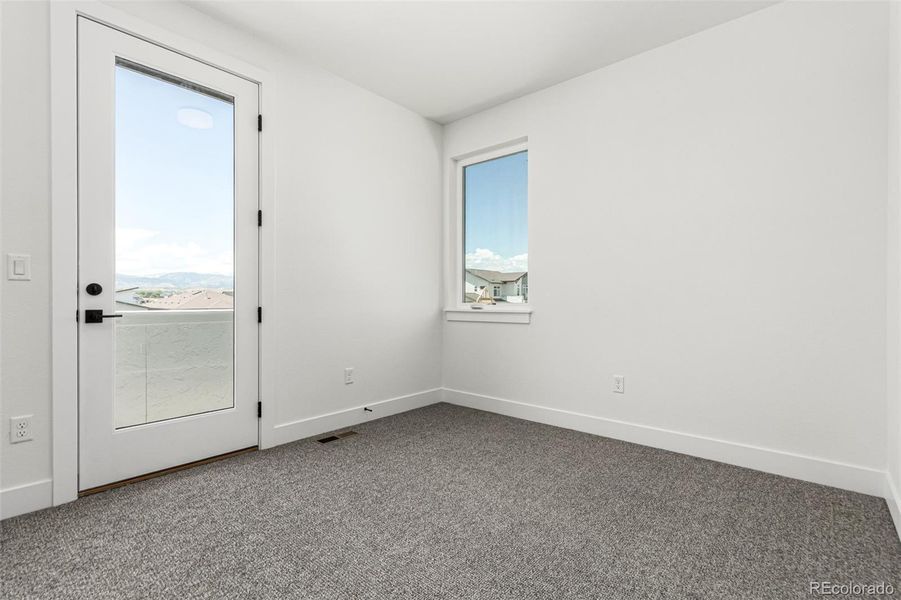 Spacious, unfurnished interior of a new home in West Grange, Longmont (Image 20).