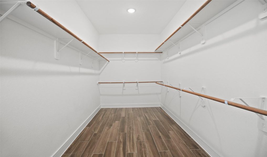 Primary walk-in closet (*Photo not of actual home and used for illustration purposes only.) Primary walk-in closet (*Photo not of actual home and used for illustration purposes only.)