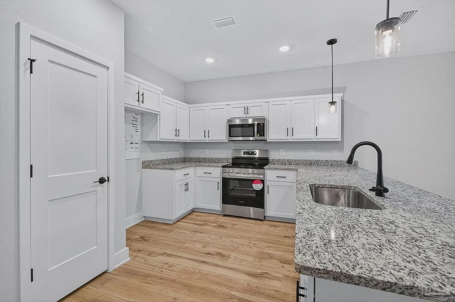Furnished interior view inside a new home in Cypress Hollow, Pensacola (Image 5).
