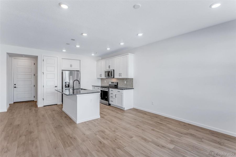 Furnished interior view inside a new home in Westside Crossing, Berthoud (Image 9).