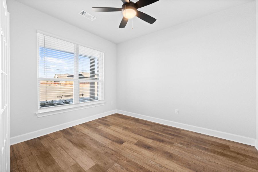 Spacious, unfurnished interior of a new home in Whisper Valley, Manor (Image 14).