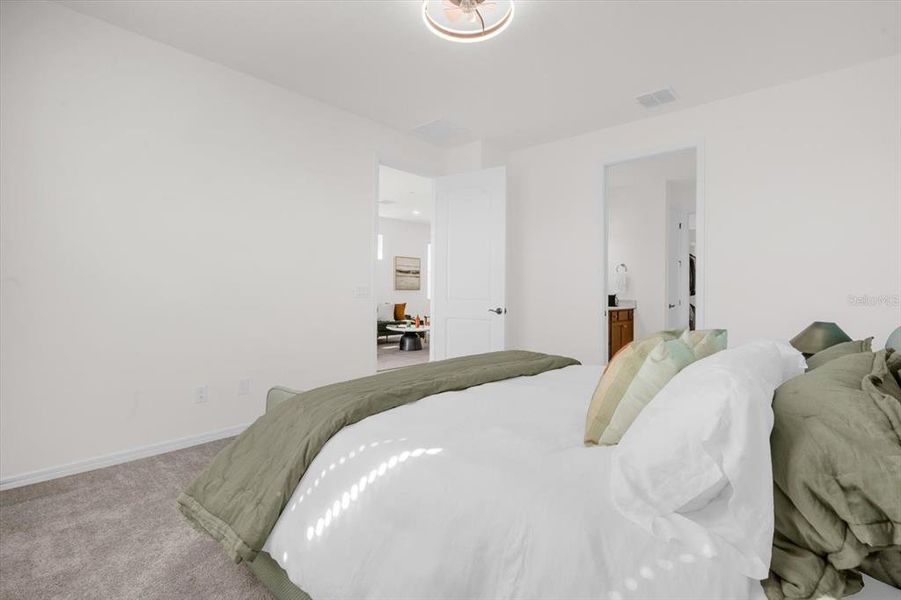 Furnished interior view inside a new home in Tohoqua Reserve, Kissimmee (Image 24).