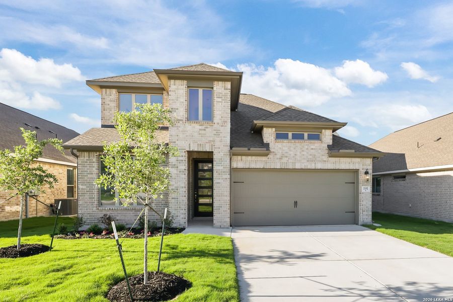 Front exterior of a new home in Nopal Valley, San Antonio, TX, highlighting curb appeal (Image 25).