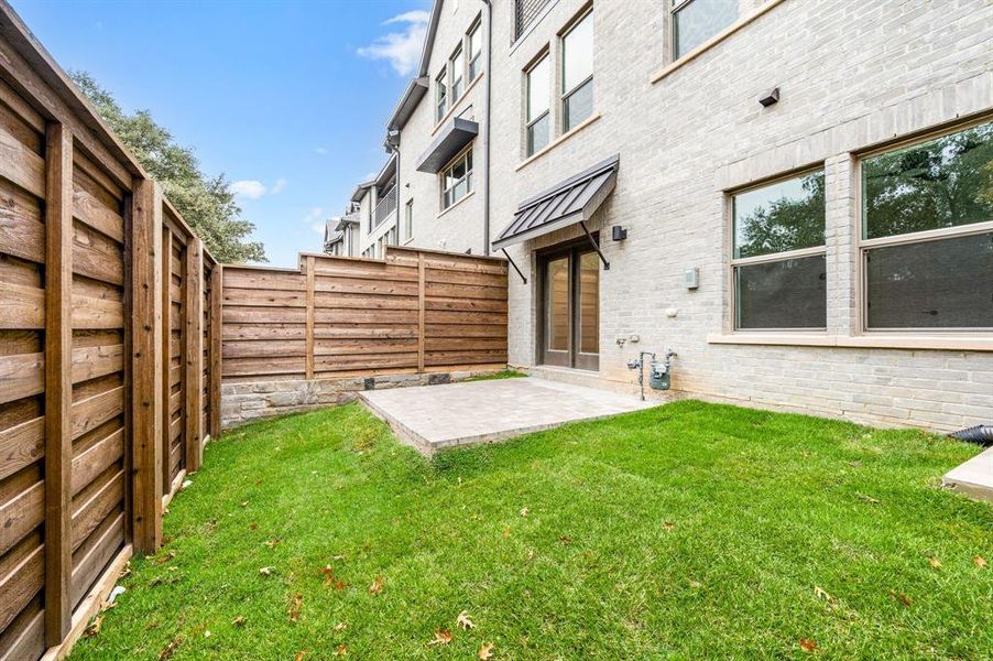 Just off the main floor flex space, you'll enjoy a private, fenced backyard. Just off the main floor flex space, you'll enjoy a private, fenced backyard.