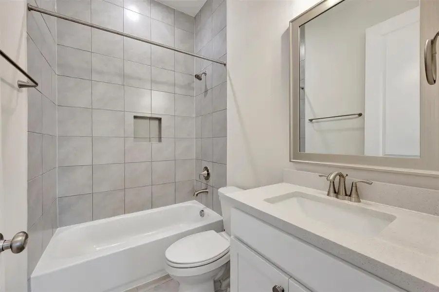 Furnished interior view inside a new home in Riceland - Enclave Row Collection, Mont Belvieu (Image 3).