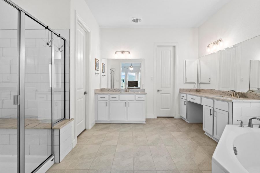 A built-in vanity nook offers the perfect spot for getting ready in the morning.