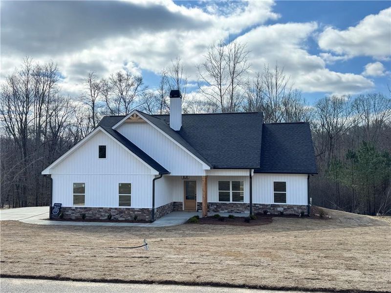 Front exterior of a new home in , Temple, GA, highlighting curb appeal (Image 1). Front exterior of a new home in , Temple, GA, highlighting curb appeal (Image 1).
