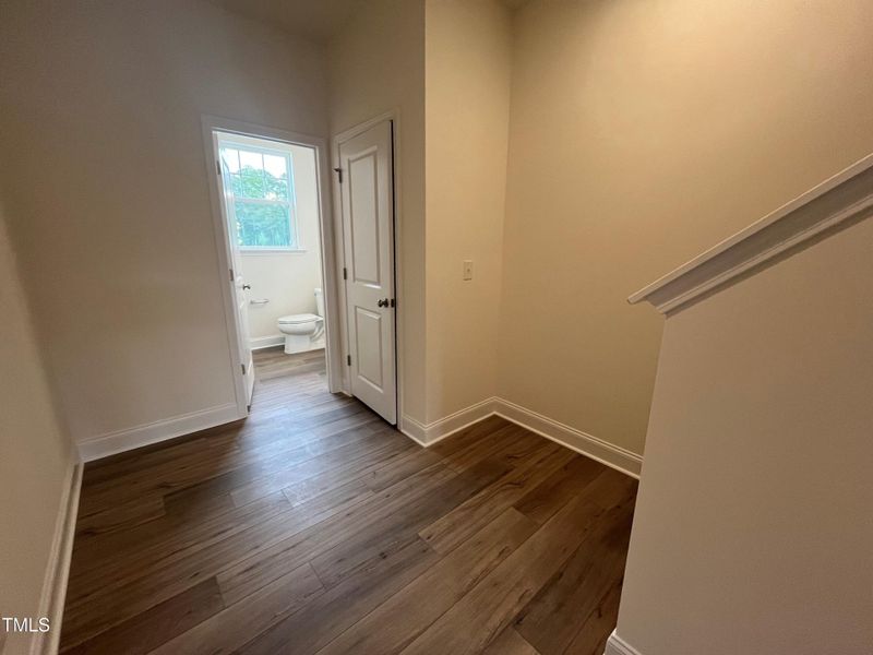 Hallway leading to back staircase