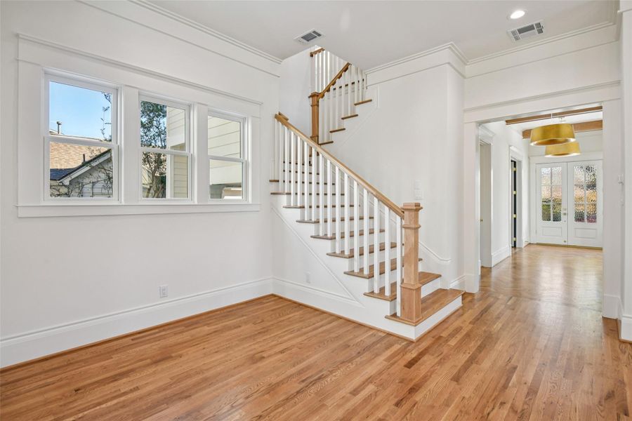 The breakfast area sits under a triple set of windows directly across from the kitchen. The breakfast area sits under a triple set of windows directly across from the kitchen.