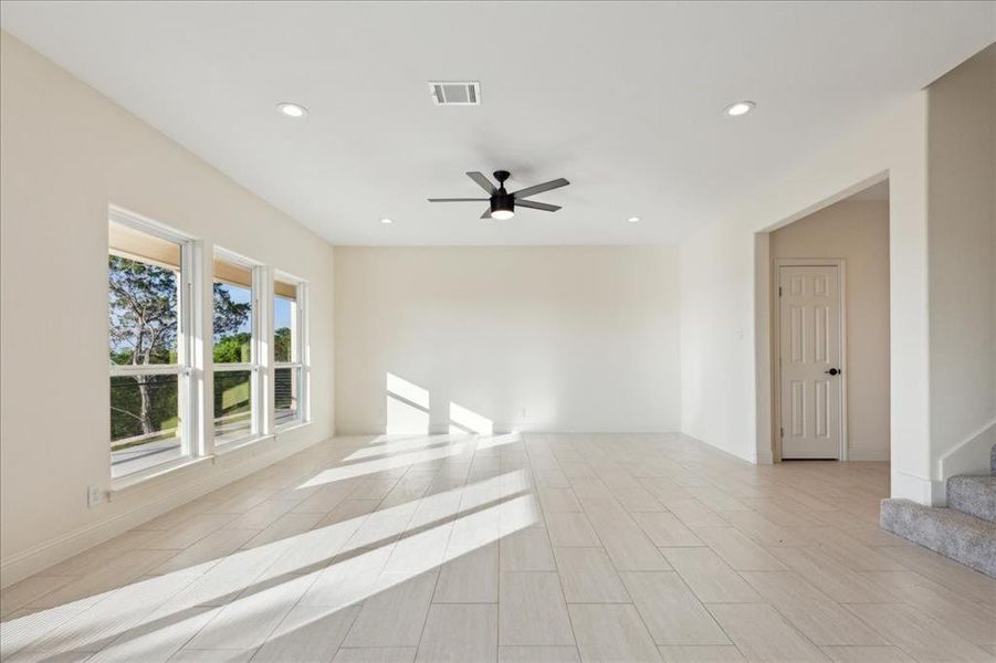 Spare room featuring ceiling fan