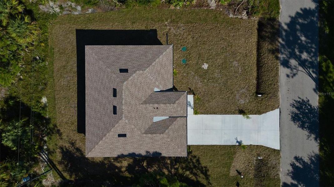 Front exterior of a new home in , Punta Gorda, FL, highlighting curb appeal (Image 1). Front exterior of a new home in , Punta Gorda, FL, highlighting curb appeal (Image 1).