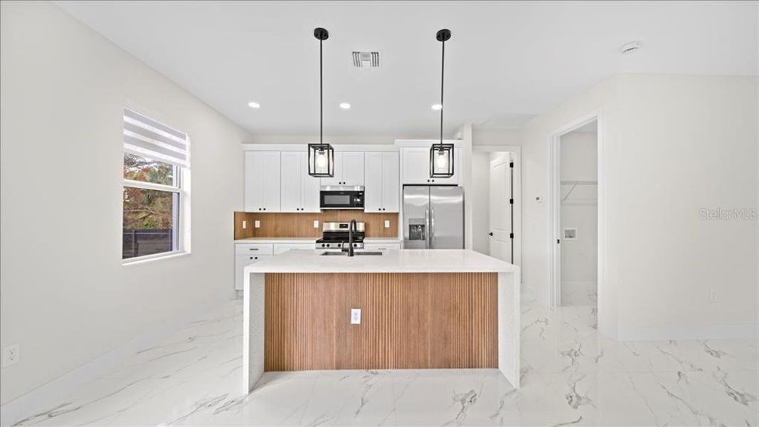 Furnished interior view inside a new home in , Port Charlotte (Image 10).