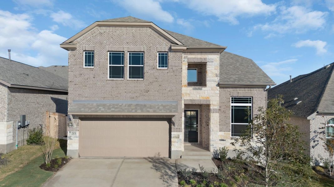 Front exterior of a new home in Nolina, Georgetown, TX, highlighting curb appeal (Image 18).