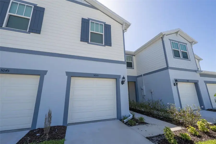 Front exterior of a new home in , Melbourne, FL, highlighting curb appeal (Image 2). Front exterior of a new home in , Melbourne, FL, highlighting curb appeal (Image 2).