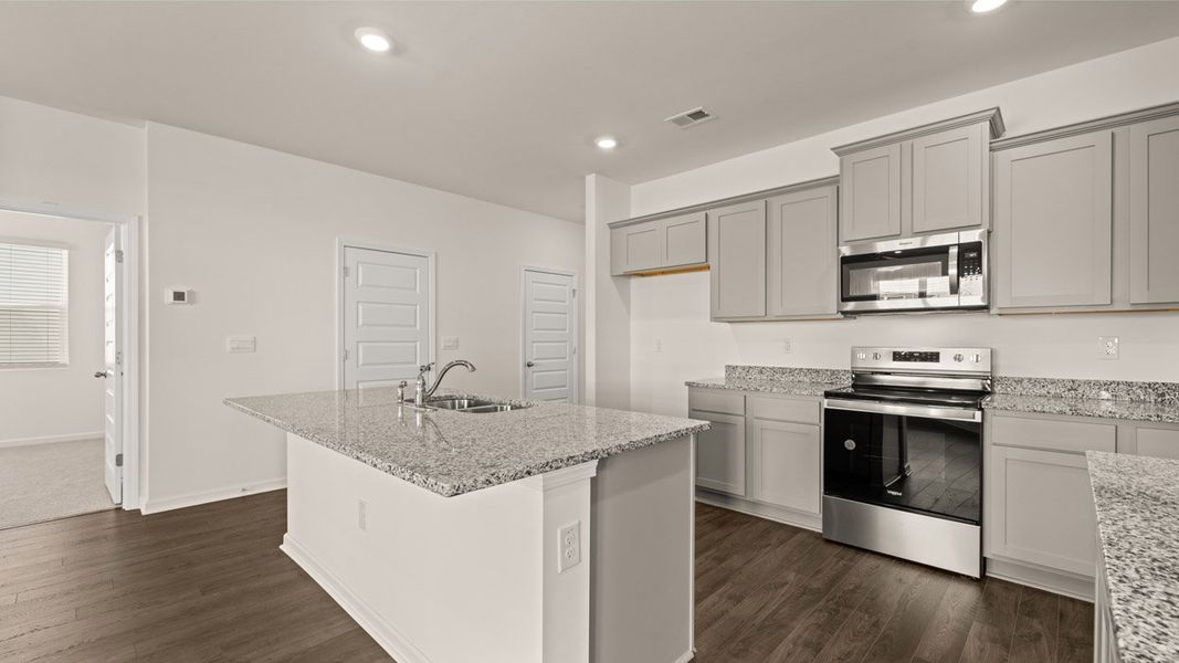 Representative furnished interior of a home built from the Belfort by D.R. Horton in Locust Grove Station - Cedar Ridge, Locust Grove (Image 5).