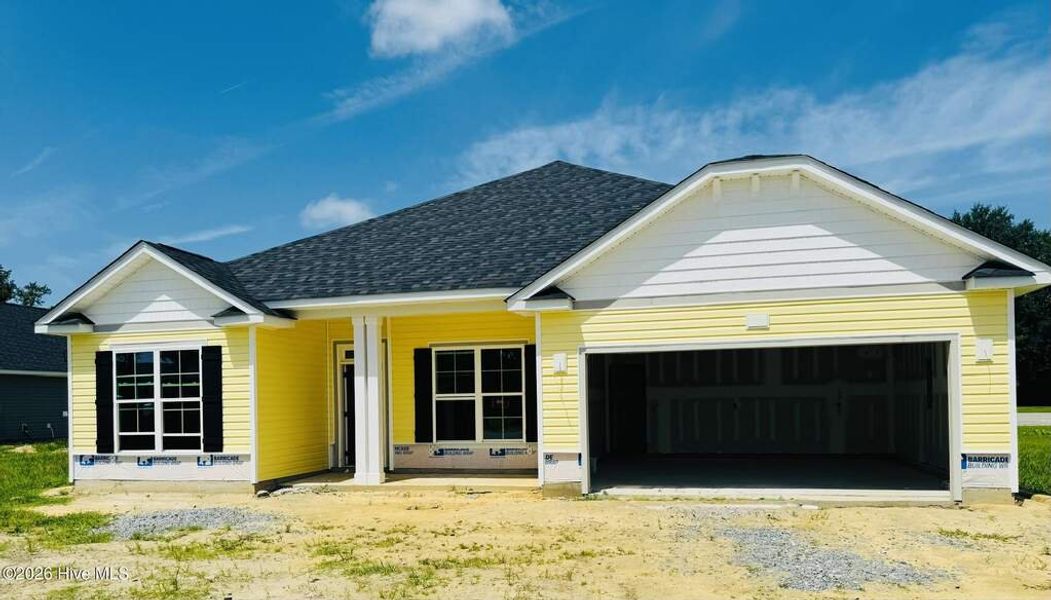 Front exterior of a new home in Blair Ridge, La Grange, NC, highlighting curb appeal (Image 2). Front exterior of a new home in Blair Ridge, La Grange, NC, highlighting curb appeal (Image 2).