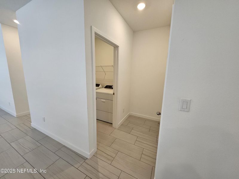 Spacious, unfurnished interior of a new home in Lakes at Bella Lago - Signature Series, Green Cove Springs (Image 19).