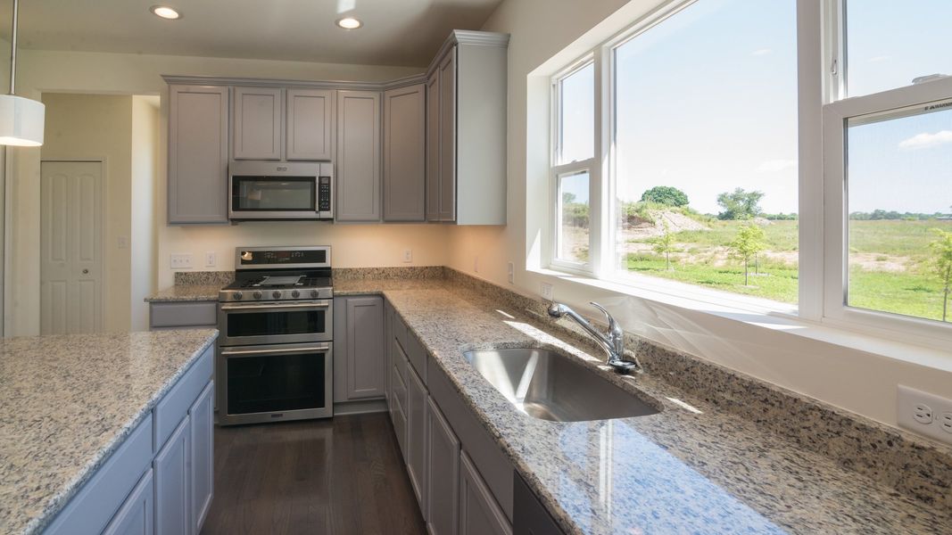 Representative furnished interior of a home built from the The Briarhaven III by Norfolk Homes in Coronado Estates, Jackson (Image 15).