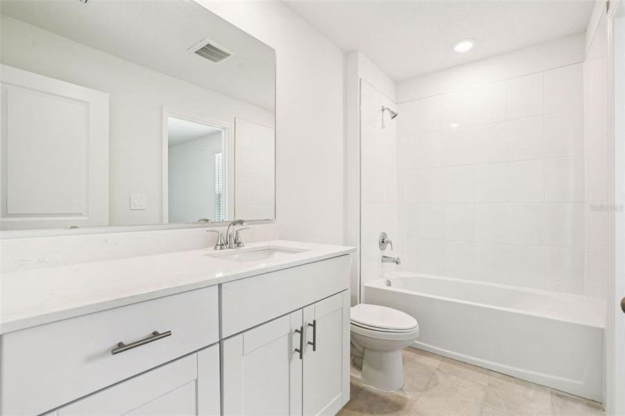 Furnished interior view inside a new home in Bradford Park, Ormond Beach (Image 9).