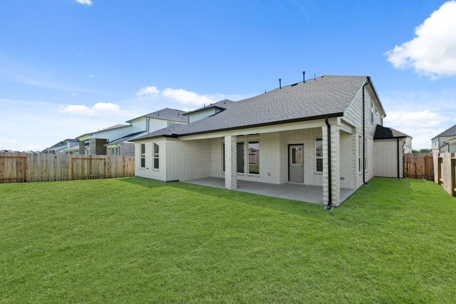 Front exterior of a new home in Briarwood Crossing, Rosenberg, TX, highlighting curb appeal (Image 1).