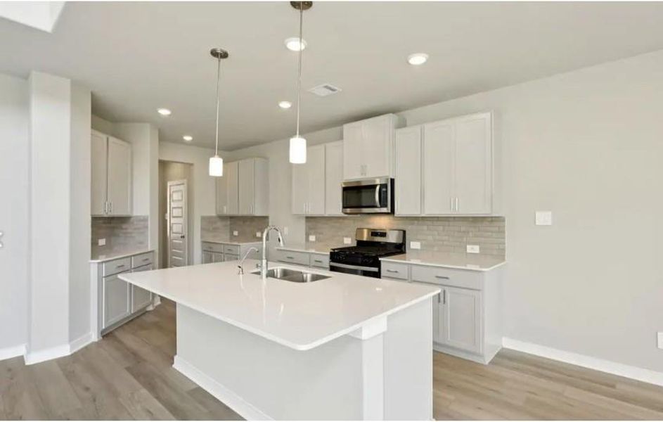 Photo is not of the actual home, but is an inspirational photo of builder’s model home and may depict options, furnishings, and/or decorator features that are not included Photo is not of the actual home, but is an inspirational photo of builder’s model home and may depict options, furnishings, and/or decorator features that are not included