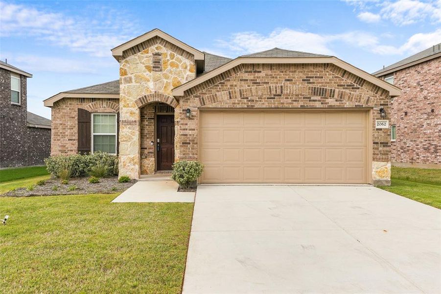 Front exterior of a new home in Arbordale, Forney, TX, highlighting curb appeal (Image 18).