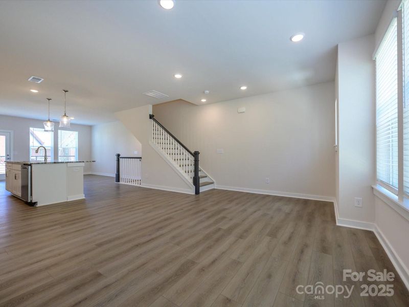 Spacious, unfurnished interior of a new home in Central Living at Craig, Charlotte (Image 22).