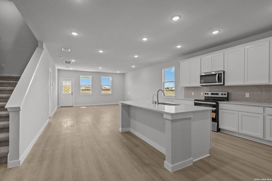 Furnished interior view inside a new home in Cinco Lakes, San Antonio (Image 7).