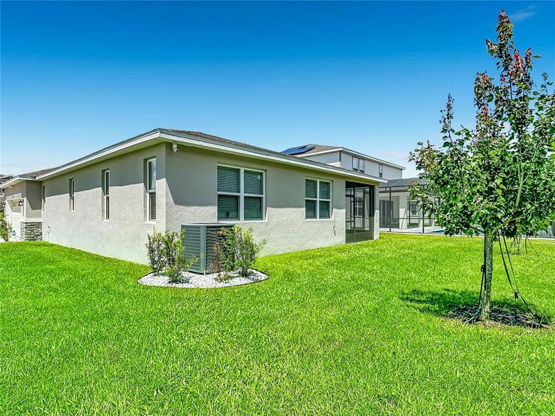 Exterior details and patio area of a home in Seasons at Big Sky, Kissimmee (Image 31).