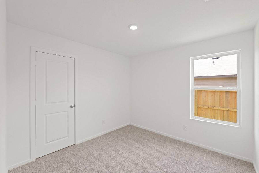 Spacious, unfurnished interior of a new home in The Canopies, Splendora (Image 14).