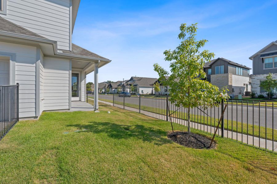 Fenced backyard featuring a patio and a residential view Fenced backyard featuring a patio and a residential view