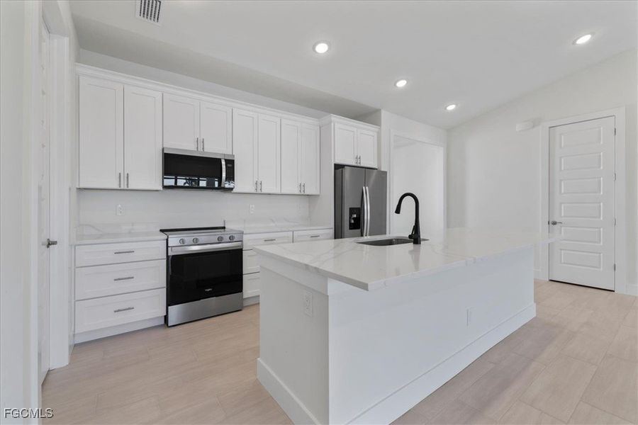 Furnished interior view inside a new home in Cape Coral, Cape Coral (Image 9).