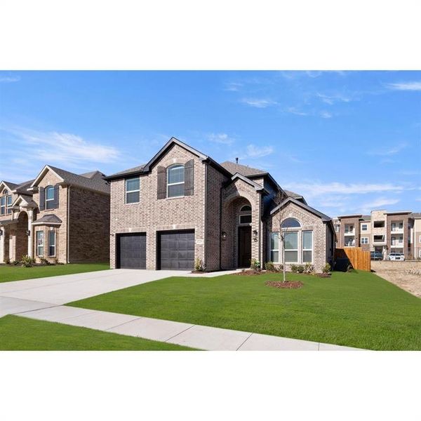 Front exterior of a new home in The Villages at Charleston, Glenn Heights, TX, highlighting curb appeal (Image 20).