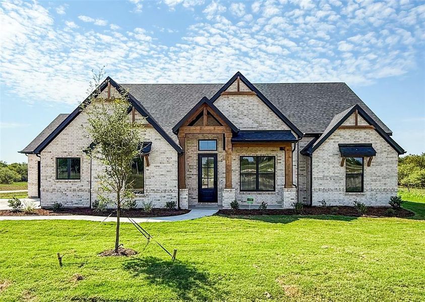 Front exterior of a new home in Rolling Creek Ranch, Aledo, TX, highlighting curb appeal (Image 20). Front exterior of a new home in Rolling Creek Ranch, Aledo, TX, highlighting curb appeal (Image 20).