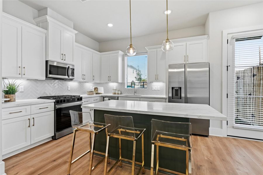 The kitchen island naturally becomes the heart of the home, bringing people together for both everyday use and entertaining. The kitchen island naturally becomes the heart of the home, bringing people together for both everyday use and entertaining.