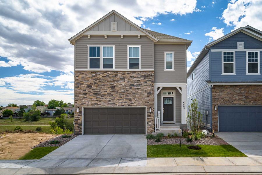 Representative exterior photo of a completed home built from the The Ethridge by David Weekley Homes in Revel Crossing at Wolf Ranch - The Panorama Collection, Colorado Springs, CO (Image 2).
