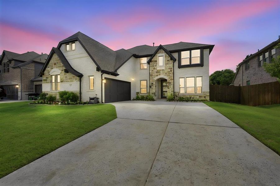 Front exterior of a new home in , Midlothian, TX, highlighting curb appeal (Image 24). Front exterior of a new home in , Midlothian, TX, highlighting curb appeal (Image 24).