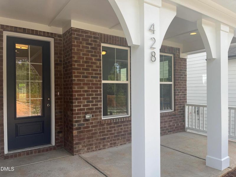 Exterior details and patio area of a home in Sage on North Main, Wake Forest (Image 3).