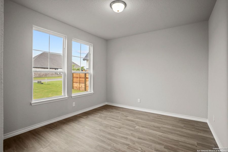 Spacious, unfurnished interior of a new home in Potranco Oaks, Castroville (Image 27).
