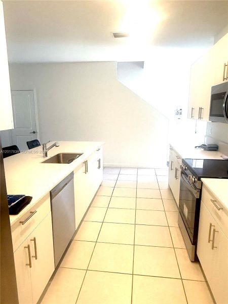 Furnished interior view inside a new home in , Dania Beach (Image 14).