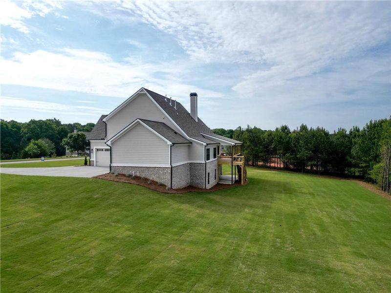 Front exterior of a new home in Stonegate, Monroe, GA, highlighting curb appeal (Image 25).