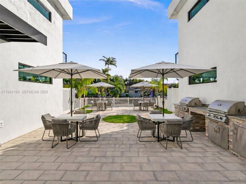 Exterior details and patio area of a home in , Dania Beach (Image 43).