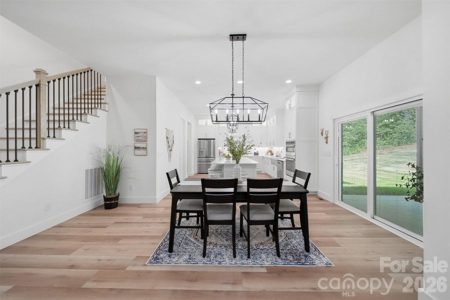 Sliding glass doors to access covered back porch.