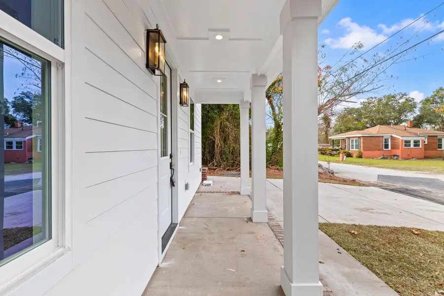 Exterior details and patio area of a home in , Charleston (Image 3).