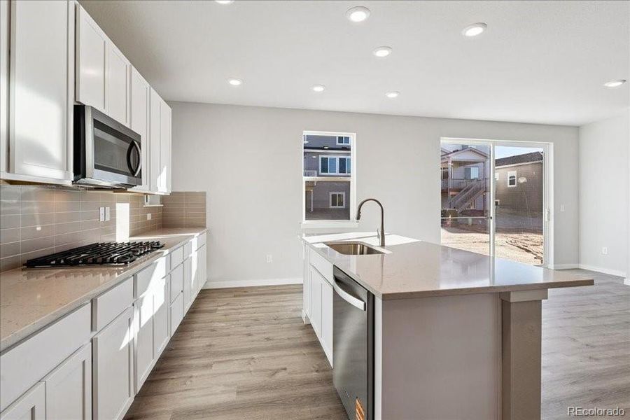 Furnished interior view inside a new home in Floret Collection at Alder Creek, Parker (Image 11). Furnished interior view inside a new home in Floret Collection at Alder Creek, Parker (Image 11).